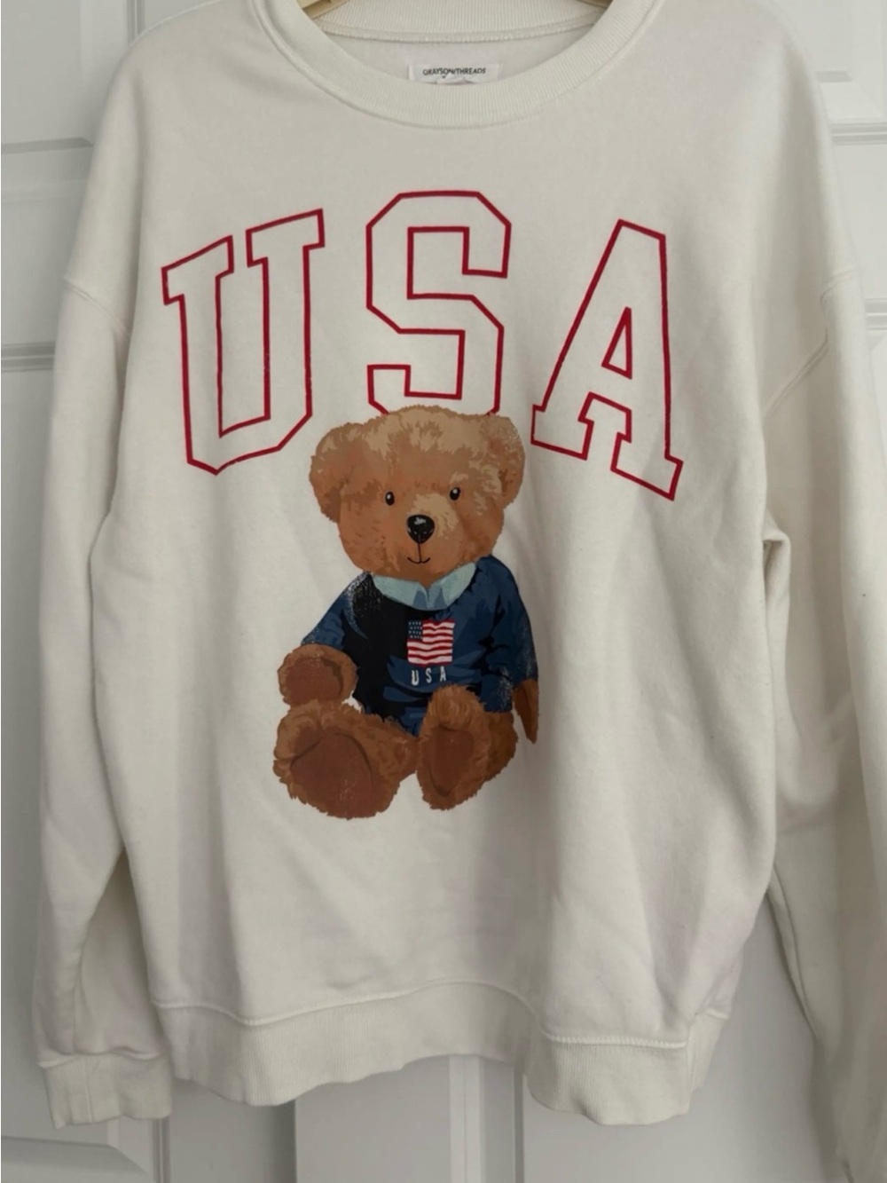 Grayson Threads White Sweatshirt with Red USA Lettering and Teddy Bear Graphic